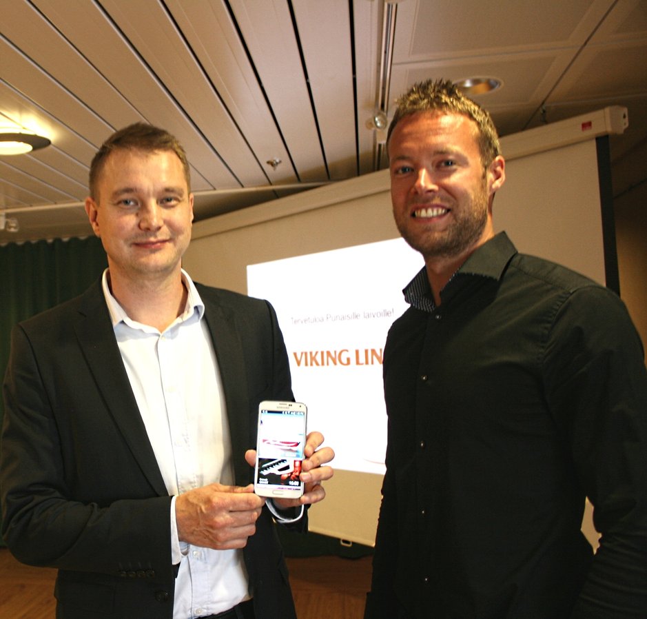 Ixonoksen kehitysjohtaja Esa Nettamo sekä Viking Linen markkinoinnin Håkan Sourander esittelevät uuden mobiilisovelluksen Ixonoksen kehitysjohtaja Esa Nettamo sekä Viking Linen markkinoinnin Håkan Sourander esittelevät uuden mobiilisovelluksen