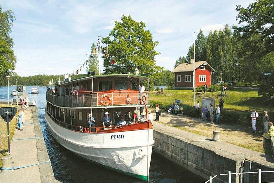 Nykyinen risteilyalus Puijo oli 100 vuotta sitten Maaningalla valmistunut höyrylotja Heino. Kuva: SAIMAAN LAIVAMATKAT OY. Nykyinen risteilyalus Puijo oli 100 vuotta sitten Maaningalla valmistunut höyrylotja Heino. Kuva: SAIMAAN LAIVAMATKAT OY.